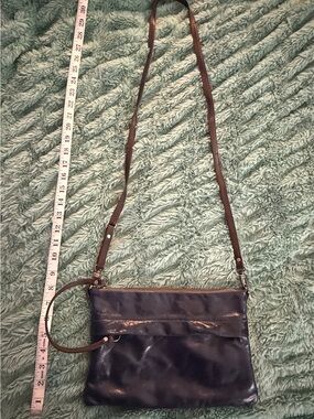 Rough and Tumble single zip pocket clutch